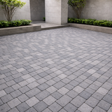 Cambridge Sherwood Ledgestone 4 1/2 x 4 1/2 patio pavers installed in Limestone Quarry blend showing small square textured pattern