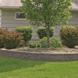 Pyzique wall system Cambridge pavingstones fire pit seating wall outdoor kitchen